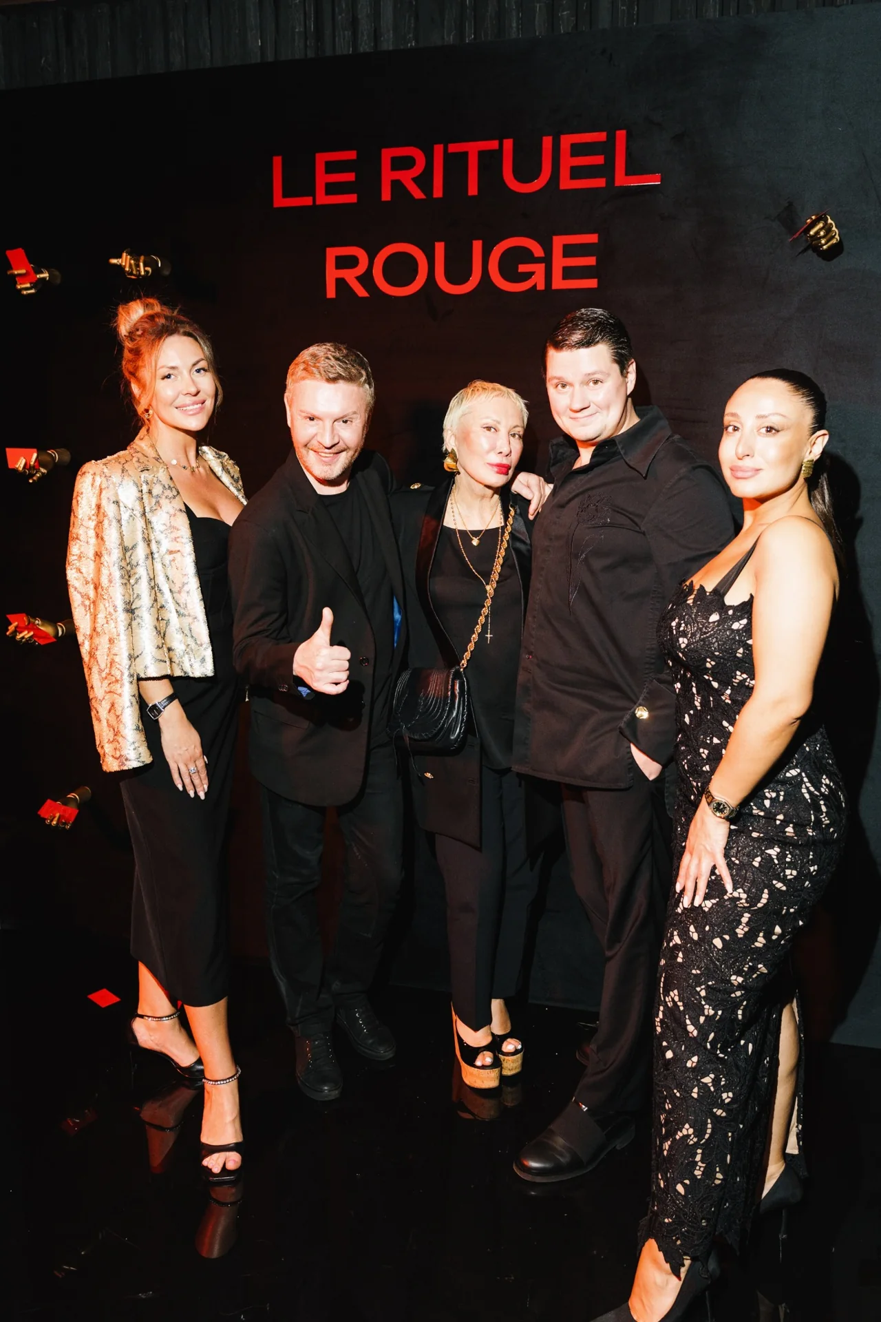 Guests at the photo backdrop